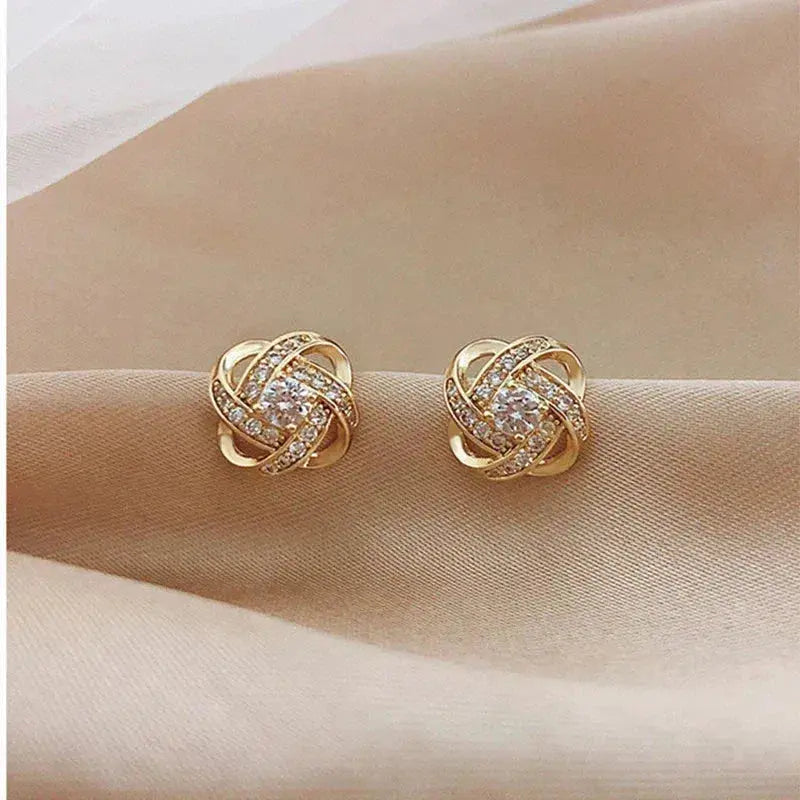 Sybil | Gold Spiral Earrings with Crystals