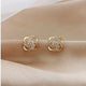 Sybil | Gold Spiral Earrings with Crystals