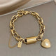 Lottie | Gold Heart Charm Bracelet