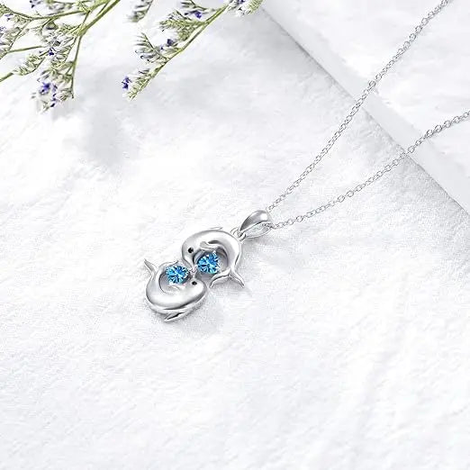 Nuala | Silver Double Dolphin Necklace with Blue Crystal