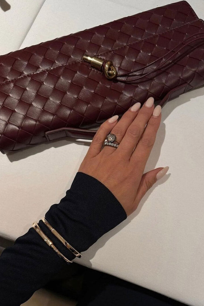 Structured Clutch with Gold Knot Detail